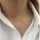 Златно колие с бляскави топчета 
