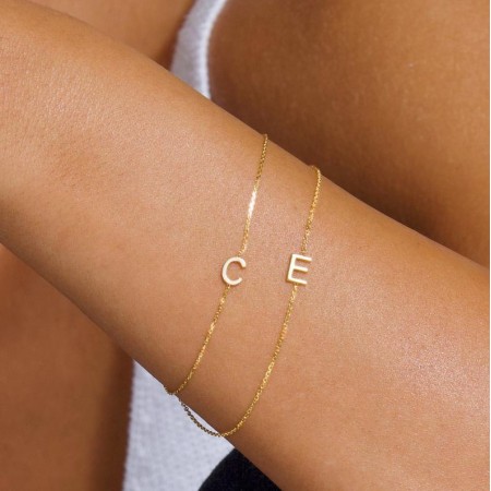 Златна гривна с кръстче и буква Златна гривна с кръстче и буква